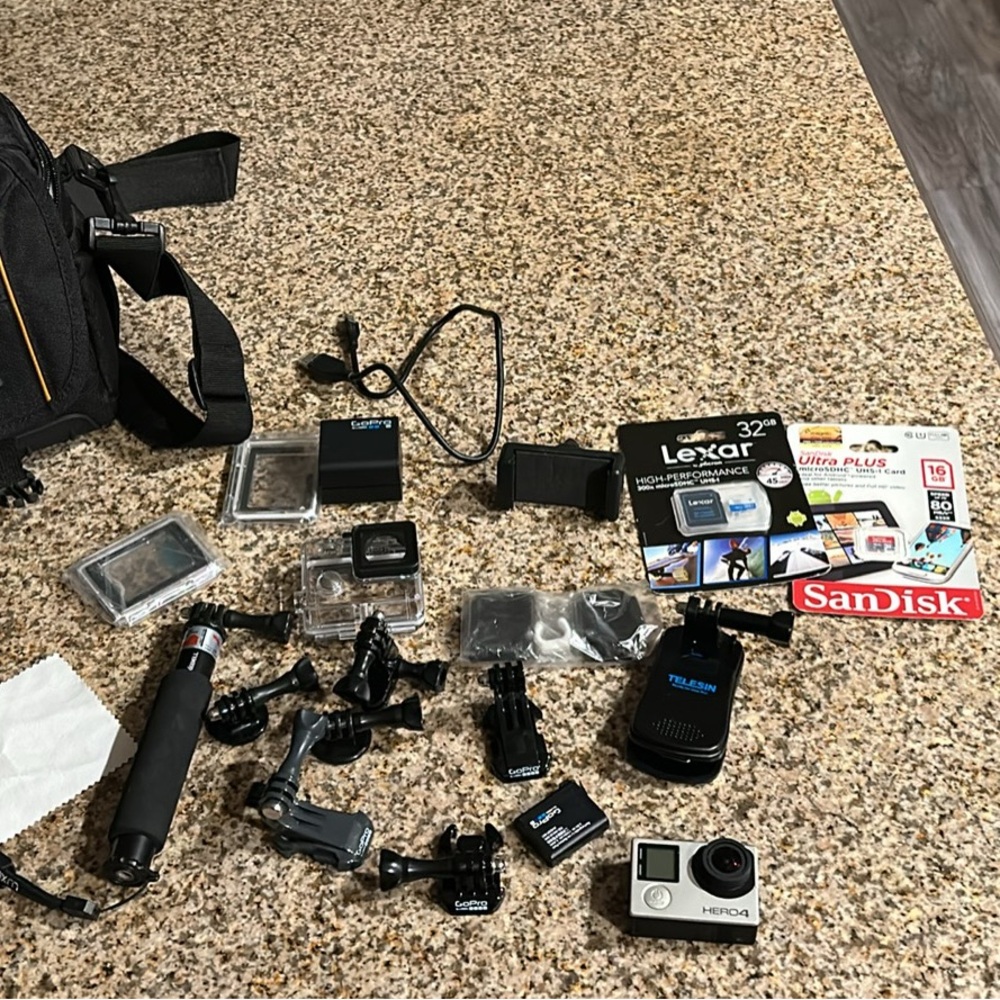 GoPro HERO4 Silver and Accessories Bundle - Black & Silver